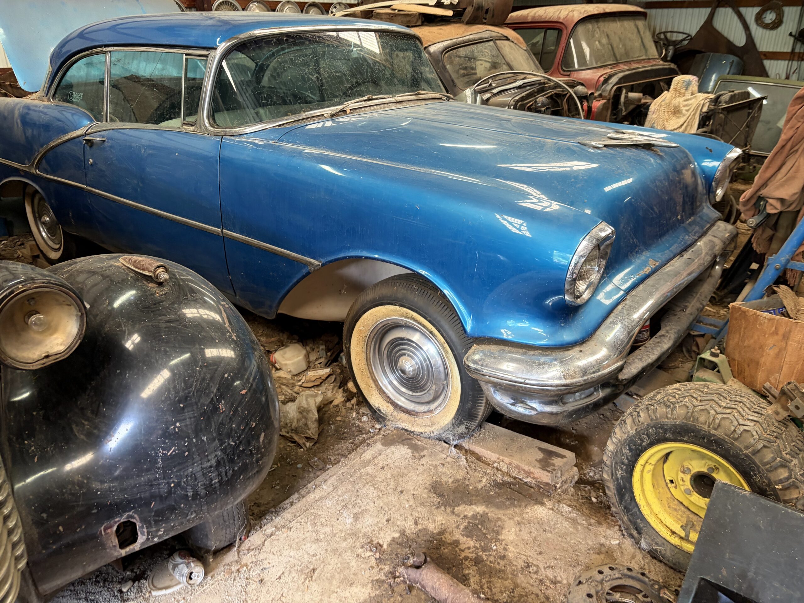 1956 Oldsmobile Holiday Coupe, blue, in barn